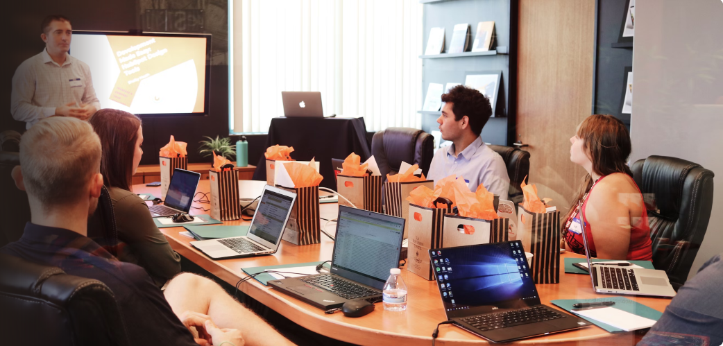 Team of professionals working with laptops in a modern office